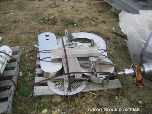 USED: 20 cu ft Patterson Kelley twin shell blender, stainless steelconstruction. Rated 65#/cu ft max material density, with liquid feedintensifier bar with drive and main drive on stands.