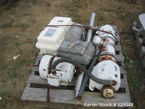 USED: 20 cu ft Patterson Kelley twin shell blender, stainless steelconstruction. Rated 65#/cu ft max material density, with liquid feedintensifier bar with drive and main drive on stands.