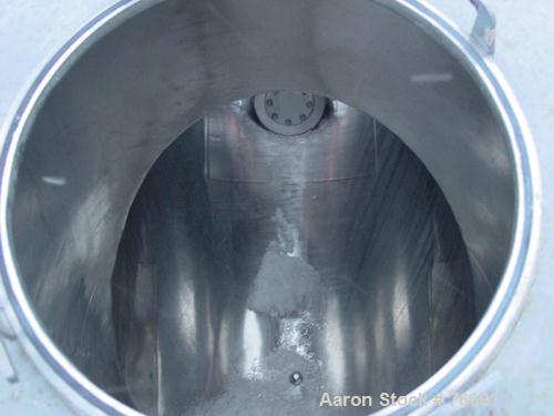 USED:Patterson Kelly 50 cu ft twin shell dry blender, stainless steel.Max material density 55 lb/cu ft. (2) 18" diameter top charge portswith quick release covers. Shell driven by a 5 hp, 3/60/208-22...