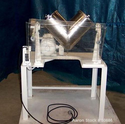 Used Patterson Kelley Twin Shell Dry Blender, .26 cubic feet (8 quart) capacity, 304 stainless steel. (2) 7-1/2" diameter x 13" long shells, 2 charge ports with 2 covers, oval bottom outlet, no cover...