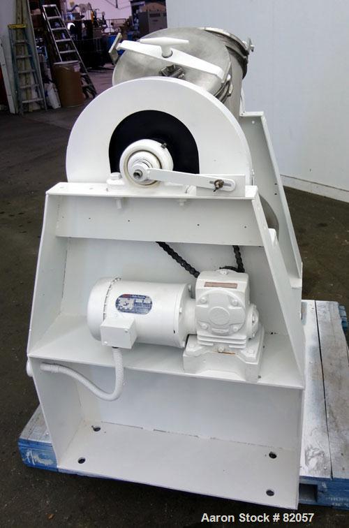 Used Patterson-Kelley Twin Shell Liquid-Solids Blender, 1 Cubic Foot Capacity, 304 Stainless Steel. Maximum material density 60 pounds per cubic foot. Solids bar with spray nozzle, driven by a 2hp, 3...