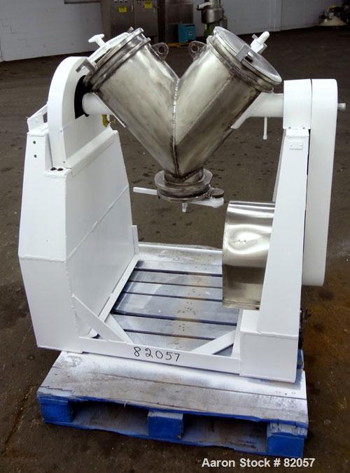 Used Patterson-Kelley Twin Shell Liquid-Solids Blender, 1 Cubic Foot Capacity, 304 Stainless Steel. Maximum material density 60 pounds per cubic foot. Solids bar with spray nozzle, driven by a 2hp, 3...