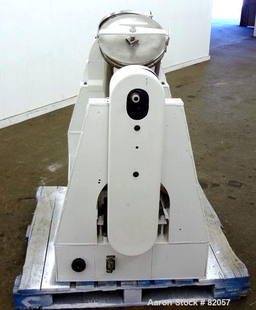Used Patterson-Kelley Twin Shell Liquid-Solids Blender, 1 Cubic Foot Capacity, 304 Stainless Steel. Maximum material density 60 pounds per cubic foot. Solids bar with spray nozzle, driven by a 2hp, 3...