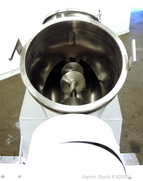 Used Patterson-Kelley Twin Shell Liquid-Solids Blender, 1 Cubic Foot Capacity, 304 Stainless Steel. Maximum material density 60 pounds per cubic foot. Solids bar with spray nozzle, driven by a 2hp, 3...