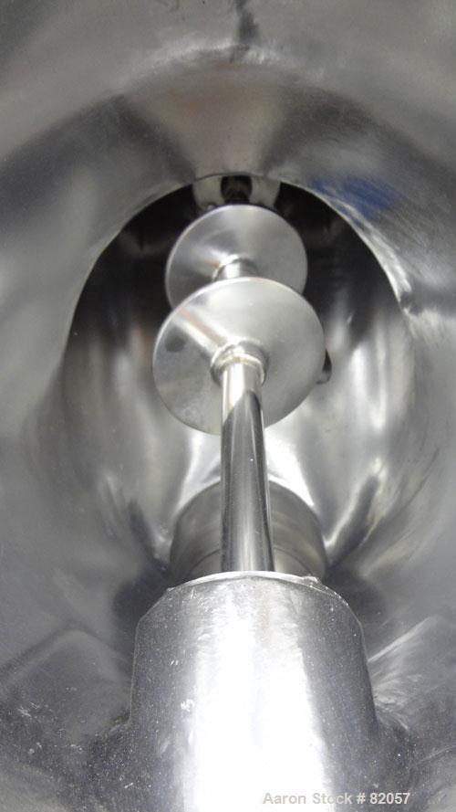 Used Patterson-Kelley Twin Shell Liquid-Solids Blender, 1 Cubic Foot Capacity, 304 Stainless Steel. Maximum material density 60 pounds per cubic foot. Solids bar with spray nozzle, driven by a 2hp, 3...