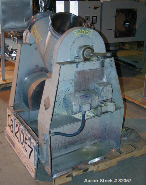 Used Patterson-Kelley Twin Shell Liquid-Solids Blender, 1 Cubic Foot Capacity, 304 Stainless Steel. Maximum material density 60 pounds per cubic foot. Solids bar with spray nozzle, driven by a 2hp, 3...