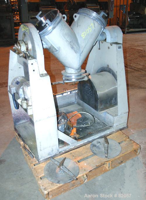 Used Patterson-Kelley Twin Shell Liquid-Solids Blender, 1 Cubic Foot Capacity, 304 Stainless Steel. Maximum material density 60 pounds per cubic foot. Solids bar with spray nozzle, driven by a 2hp, 3...