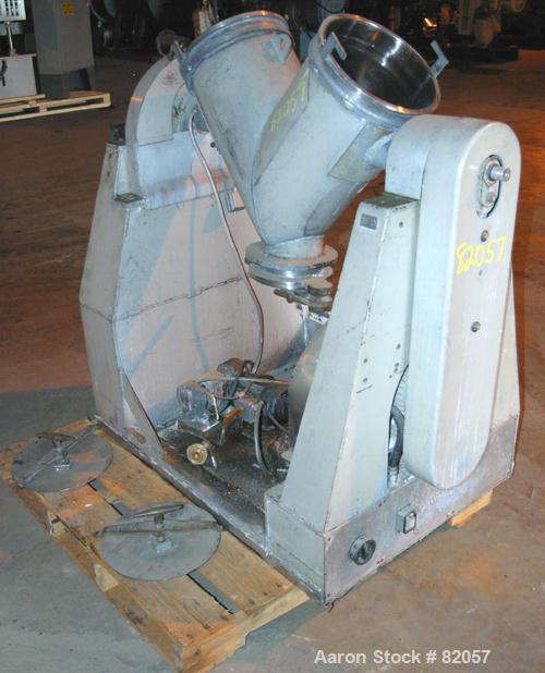 Used Patterson-Kelley Twin Shell Liquid-Solids Blender, 1 Cubic Foot Capacity, 304 Stainless Steel. Maximum material density 60 pounds per cubic foot. Solids bar with spray nozzle, driven by a 2hp, 3...