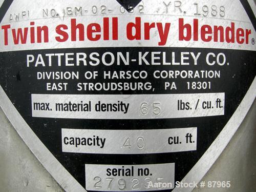 Used Patterson Kelly Twin Shell Liquid Solids Blender, 40 Cubic Feet Capacity, 304 Stainless Steel. Maximum material density 65 pounds per cubic foot. (2) 17-1/2" diameter charge ports with quick rel...