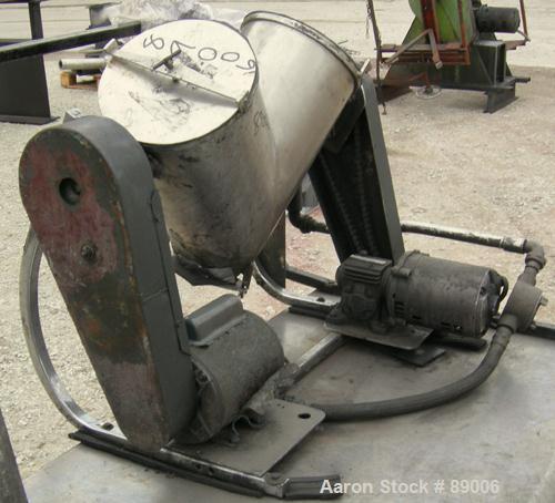USED: Patterson Kelley twin shell blender, 16 quart capacity (.52 cubic feet), 304 stainless steel. Max material density approximately 325 pounds per cubic foot. (2) 9" diameter charge ports with qui...