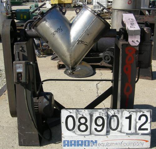 USED: Patterson Kelley twin shell liquid solids blender, 1 cubic foot working capacity, 304 stainless steel. Max material density 70 pounds per cubic foot. (2) 11" diameter charge ports with quick re...