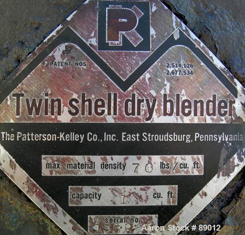 USED: Patterson Kelley twin shell liquid solids blender, 1 cubic foot working capacity, 304 stainless steel. Max material density 70 pounds per cubic foot. (2) 11" diameter charge ports with quick re...
