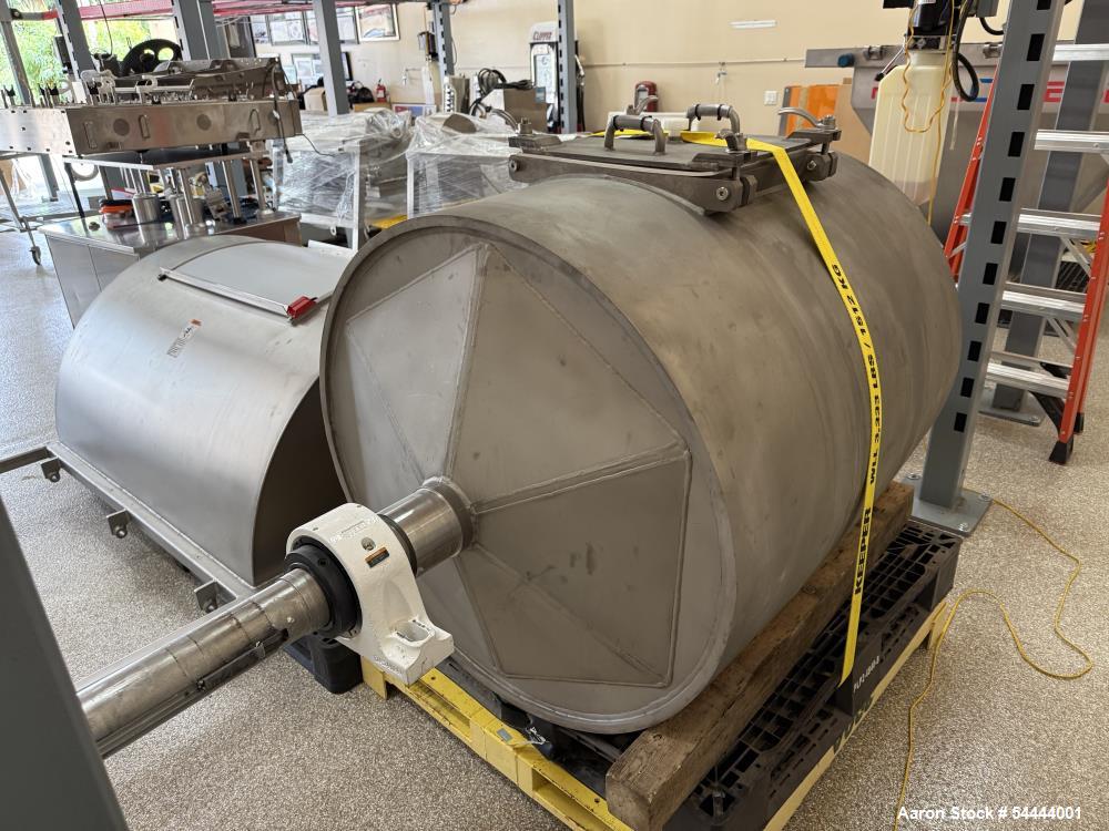 Unused Paul O Abbe Model BM-223 all-stainless-steel ball mill featuring a 2° tapered cylinder for full discharge and a split, hinged clamshell dry discharge housing. The cylinder measures 40 inches i...