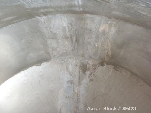 Used Paul O Abbe Rota Cone Blender, 70 Cubic Feet Working Capacity, 108 Total, 316 Stainless Steel. 72" diameter x 20" straight side x 36" cones. 16" diameter top port with cover, 10" center bottom o...