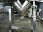 Used Bush Tank Fab Twin Shell Blender. 316 Stainless steel construction, rated 70#/cu ft max material density, provision for cantilevered bar less bar with 2 hp, 208 volt drive, main drive, 20