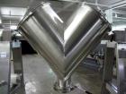 Used Bush Tank Fab Twin Shell Blender. 316 Stainless steel construction, rated 70#/cu ft max material density, provision for cantilevered bar less bar with 2 hp, 208 volt drive, main drive, 20