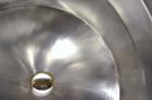 Used Gemco Slant Cone Blender, 5 Cubic Feet Working Capacity, 316 Stainless Steel. Approximately 31-1/2” diameter x 16” and 10” cones.  16” Diameter charge port with cover, 6” center bottom outlet wi...