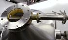 Used Gemco Slant Cone Blender, 5 Cubic Feet Working Capacity, 316 Stainless Steel. Approximately 31-1/2” diameter x 16” and 10” cones.  16” Diameter charge port with cover, 6” center bottom outlet wi...