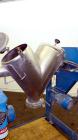 Used Patterson-Kelley Twin Shell Dry Blender, 2 Cubic Feet Capacity, 316 Stainless Steel. 325 Pounds a cubic foot maximum material density. (2) Approximate 13” diameter charge ports with quick releas...