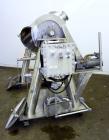 Used Patterson-Kelley Twin Shell Dry Blender, 5 Cubic Feet Capacity, 316 Stainless Steel. 95 Pounds a cubic foot maximum material density. (2) Approximate 19-1/2” diameter charge ports with quick rel...
