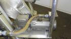 Used Patterson-Kelley Twin Shell Dry Blender, 5 Cubic Feet Capacity, 316 Stainless Steel. 95 Pounds a cubic foot maximum material density. (2) Approximate 19-1/2” diameter charge ports with quick rel...
