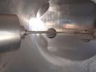 Used Patterson-Kelley Twin Shell Liquid Solids Blender, 75 Cubic Foot Capacity, 304 Stainless Steel. Maximum material density 15 pounds per cubic foot. (2) 18