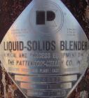 Used Patterson-Kelley Twin Shell Liquid Solids Blender, 75 Cubic Foot Capacity, 304 Stainless Steel. Maximum material density 15 pounds per cubic foot. (2) 18