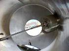 Used Patterson-Kelley Twin Shell Liquid Solids Blender, 75 Cubic Foot Capacity, 304 Stainless Steel. Maximum material density 15 pounds per cubic foot. (2) 18