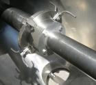 Used Patterson Kelley Twin Shell Liquid Solids Blender, 3 cubic feet capacity, 304 stainless steel. 60 pounds per cubic foot max material density. Liquid solids bar, driven by a 2 hp, 3/60/230/460 vo...
