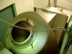 Used Patterson Kelley Twin Shell Crossflow Blender, 50 cubic feet, stainless steel construction. Rated 65 pounds per cubic foot maximum material density. Standard feed ports with covers, 10 outlet wi...