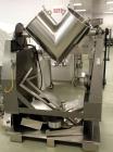 Used Patterson Kelley Twin Shell Blender, 2 Cubic Foot. Stainless steel construction, rated 195 lbs/cu. ft. max material density, standard access ports with covers, with 3/4 HP 230/460 volt shell dri...