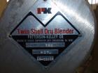Used Patterson Kelley Twin Shell Blender, 4 Quart. Stainless steel construction. 150 lbs/cu. ft. max material density. Standard access ports with covers, pin bar driven by a 1/4 HP 115/230 volt, shel...