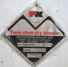 Used Patterson-Kelley Twin Shell Dry Blender, 75 cubic feet, stainless steel. 60 Pounds per cubic foot maximum material density. Top charge ports with covers, 8'' center bottom outlet with butterfly ...