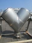 Used Patterson-Kelley 50 Cubic Feet Twin Shell Blender. Stainless steel construction, rated for 50 pounds per cubic foot maximum material density, 5 hp variable speed shell motor drive, provision for...