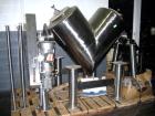 Used Patterson Kelley Twin Shell Blender, 20 Cubic Feet. Stainless steel construciton, rated 70#/ cu. ft. maximum material density, 5 hp, 230/460 volt xp main drive, standard feed ports with covers, ...