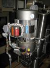 Used Patterson Kelley Twin Shell Blender, 20 Cubic Feet. Stainless steel construciton, rated 70#/ cu. ft. maximum material density, 5 hp, 230/460 volt xp main drive, standard feed ports with covers, ...
