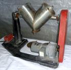 Used Patterson Kelley Twin Shell Dry Blender, 4 Quart Capacity (0.16 Cubic Feet), 304 Stainless Steel. (2) 5-1/2” diameter charge ports with quick release covers. Shells 5-1/2” diameter x 9-1/2” deep...