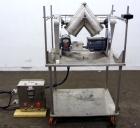 Used Patterson Kelley Twin Shell Liquid Solids Blender, 0.26 Cubic Feet Capacity (8 Quart), 304 Stainless Steel. 140 Pounds per cubic foot maximum material density. 2) 7” Diameter charge ports with q...