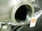 Used Patterson-Kelley Twin Shell Dry Blender, 20 Cubic Feet, Stainless Steel. 55 Pounds a cubic foot maximum material density, standard charge ports with covers, 6