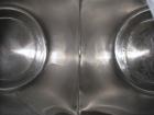 Used Patterson-Kelley Twin Shell Dry Blender, 10 Cubic Feet, Stainless Steel. 90 Pounds a cubic foot maximum material density, standard charge ports with covers, 6