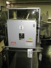 Used Patterson-Kelley Twin Shell Blender, 16 Quart, Stainless Steel. Rated 125/140 pounds a cubic foot maximum material density, with liquid feed bar, plastic enclosure with both shell and bar drives...