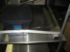 Used Patterson-Kelley Twin Shell Blender, 16 Quart, Stainless Steel. Rated 125/140 pounds a cubic foot maximum material density, with liquid feed bar, plastic enclosure with both shell and bar drives...