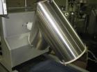 Used Patterson-Kelley Twin Shell Blender, 16 Quart, Stainless Steel. Rated 125/140 pounds a cubic foot maximum material density, with liquid feed bar, plastic enclosure with both shell and bar drives...