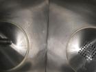 Used Patterson-Kelley Twin Shell Blender, 16 Quart, Stainless Steel. Rated 125/140 pounds a cubic foot maximum material density, with liquid feed bar, plastic enclosure with both shell and bar drives...