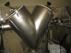 Used Patterson-Kelley Twin Shell Dry Blender, 2 Cubic Feet, Stainless Steel. 60 Pounds a cubic foot maximum material density, standard charge ports with covers. 1hp Bar dive, 2hp, 230/460 volt shell ...