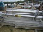 USED: 20 cu ft Patterson Kelley twin shell blender, stainless steelconstruction. Rated 65#/cu ft max material density, with liquid feedintensifier bar with drive and main drive on stands.