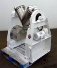 Used Patterson-Kelley Twin Shell Liquid-Solids Blender, 1 Cubic Foot Capacity, 304 Stainless Steel. Maximum material density 60 pounds per cubic foot. Solids bar with spray nozzle, driven by a 2hp, 3...