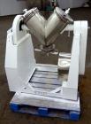 Used Patterson-Kelley Twin Shell Liquid-Solids Blender, 1 Cubic Foot Capacity, 304 Stainless Steel. Maximum material density 60 pounds per cubic foot. Solids bar with spray nozzle, driven by a 2hp, 3...