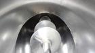 Used Patterson-Kelley Twin Shell Liquid-Solids Blender, 1 Cubic Foot Capacity, 304 Stainless Steel. Maximum material density 60 pounds per cubic foot. Solids bar with spray nozzle, driven by a 2hp, 3...