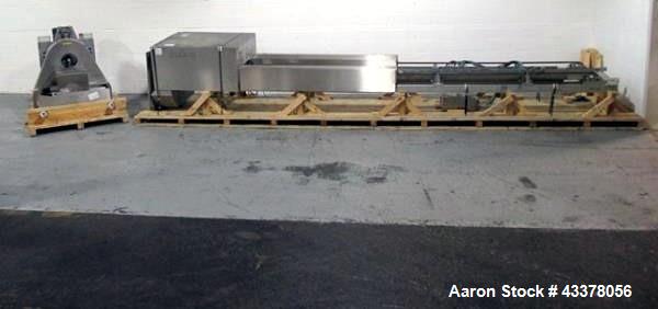 Used LB Bohle Bin Blender, Model PM2000. Stainless steel product contact surfaces, 1500 kw max load capacity, approximately 14' rise, approximately 24'6" overall height, post design with dual columns...